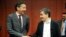Dutch Finance Minister and chairman of the eurogroup Jeroen Dijsselbloem, left, shakes hands with Greek Finance Minister Euclid Tsakalotos during a meeting of eurozone finance ministers at the EU Council building in Brussels, Aug. 14, 2015.