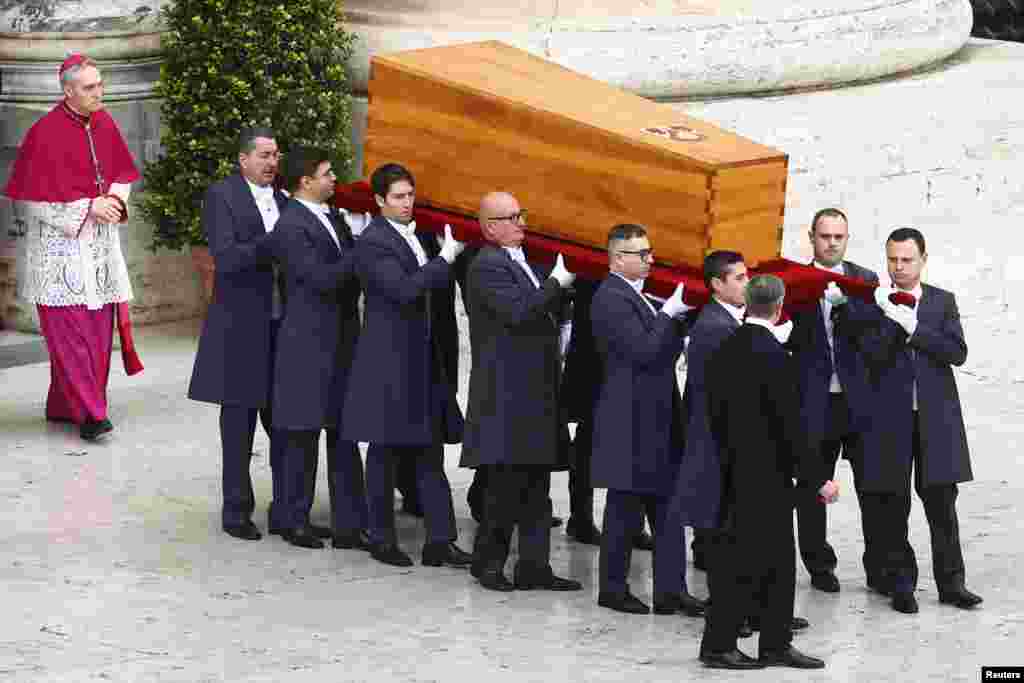 The coffin of former Pope Benedict is carried during his funeral, in St. Peter&#39;s Square at the Vatican, Jan. 5, 2023.&nbsp;