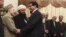 Pakistan's Prime Minister Raja Pervez Ashraf (R) shakes hands with members of Afghanistan's High Peace Council at the prime minister's residence in Islamabad, November 12, 2012. 