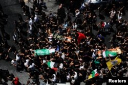 Filistinliler İsrail askeri operasyonu sırasında ölenler için Cenin'de cenaze töreni düzenledi- 5 Temmuz 2023