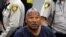 FILE - In this May 14, 2013, file photo, O.J. Simpson sits during a break o