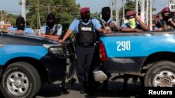 Police block the entrance of Divine Mercy Catholic Church in Managua, Nicaragua, July 14, 2018. 