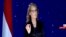 This Nov. 5, 2017 image taken from video, shows American actress Helen Hunt speaking during a government-organized youth conference in the Red Sea resort of Sharm el-Sheikh, Egypt. Egyptian activists have condemned Hunt for her participation in the conference that they say is whitewashing authorities' appalling human rights record and suppression of free speech. The open letter by Mona Seif and other well-known human rights advocates gained nearly 300 signatures by the afternoon of Tuesday, Nov. 7, 2017. Arabic reads, "Live, Sharm el Sheikh."