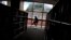 FILE - A man is silhouetted at a library in Singapore. 