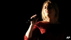 Adele performs at the 58th annual Grammy Awards in Los Angeles, Feb. 15, 2016. 