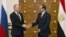 Russia's President Vladimir Putin (L) meets with Egypt's President Abdel Fattah al-Sisi in Cairo, Dec. 11, 2017. 