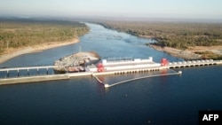 FILE - A general view of the Cambodia's 400 megawatt Lower Sesan 2 hydroelectric dam is seen during the inauguration in Stung Treng province on December 17, 2018.