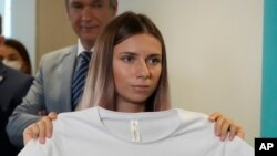 Belarusian Olympic sprinter Krystsina Tsimanouskaya, who came to Poland on Wednesday fearing reprisals at home after criticizing her coaches at the Tokyo Games, is shown after her news conference in Warsaw, Poland, on Aug. 5, 2021.