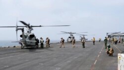 아라비아해로 작전 중인 미 중부사령부(CENTCOM)의 군용 헬기와 병력의 모습.