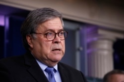 FILE - Attorney General William Barr speaks in the James Brady Press Briefing Room of the White House in Washington, April 1, 2020.