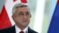 The Armenian opposition says the changes voted on Sunday are a ruse to let President Serzh Sarksyan, pictured in October in Tbilisi, Georgia, take on an enhanced prime ministerial role at the end of his presidential term in 2018.