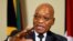 FILE - South Africa's President Jacob Zuma gestures during a media briefing in Pretoria, Nov. 26, 2014. 