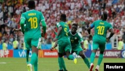 Les joueurs du Sénégal après leur premier but contre la Pologne, le 19 juin 2018.