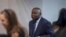 FILE - Former Ivory Coast president Laurent Gbagbo enters the courtroom at the International Criminal Court in The Hague, Netherlands, Jan. 15, 2019.