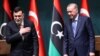 Turkiya Prezidenti Rajab Toyyib Erdog'an (o'ngda) va Liviya Bosh vaziri Fayoz Sarraj. Anqara, 4-iyun, 2020. 