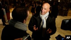 Tom Barrack, chairman of the inaugural committee, speaks with reporters in the lobby of Trump Tower in New York, Jan. 10, 2017.