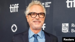 FILE - Director Alfonso Cuaron poses on the red carpet before "Disclaimer" is screened at the Toronto International Film Festival, Sept. 9, 2024.