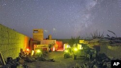 US Marines lie down inside a small patrol base during a pause in an all night mission in Helmand province, southern Afghanistan, October 2009. (file photo)