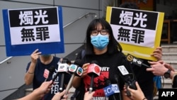 FILE - Political activist and barrister Chow Hang Tung speaks to the media after leaving Tsuen Wan police station a day after being arrested in Hong Kong, June 5, 2021.