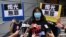 FILE - Political activist and barrister Chow Hang Tung speaks to the media after leaving Tsuen Wan police station a day after being arrested in Hong Kong, June 5, 2021.