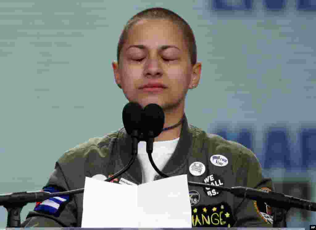 Emma Gonzalez, a survivor of the mass shooting at Marjory Stoneman Douglas High School in Parkland, Fla., closes her eyes and cries as she stands silently at the podium for the amount of time it took the Parkland shooter to go on his killing spree during the &quot;March for Our Lives&quot; rally in support of gun control in Washington, Saturday, March 24, 2018. (AP Photo/Alex Brandon)