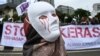 Seorang aktivis berpartisipasi dalam pawai Hari Buruh Internasional di Jakarta, 1 Mei 2019. (Foto: AFP)