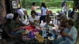 Volunteers restore used toys to donate them to vulnerable children as Christmas presents, at the non-profit foundation Hospital de los Peluches, or Hospital of Stuffed Animals, in Caracas, Venezuela, Thursday, Dec. 5, 2024. (AP Photo/Ariana Cubillos)