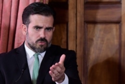 FILE - Puerto Rico Governor Ricardo Rossello speaks during a press conference in La Fortaleza's Tea Room, in San Juan, July 16, 2019.