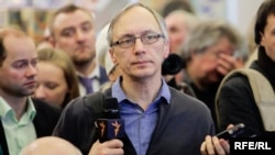 Radio Free Europe/Radio Liberty correspondent Ales Dashchynski is seen in an undated file photo.