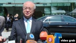 FILE - International Atomic Energy Agency Director-General Yukiya Amano speaks to reporters outside the Palais Coburg, the venue for nuclear talks in Vienna, July 4, 2015.