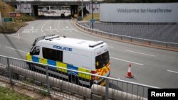 A police van is parked near to the entrance to Heathrow Airport, following a protest by the 'Black Lives Matter' movement, in London, Britain, August 5, 2016. 