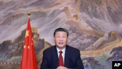 Presiden China Xi Jinping menyampaikan pesan Tahun Baru pada hari Selasa, 31 Desember 2024 di Beijing untuk menyambut tahun 2025. (Ju Peng/Xinhua via AP)