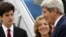 U.S. Ambassador to Japan Caroline Kennedy and her son, Jack Schlossberg, greet Secretary of State John Kerry as he arrives, ahead of G-7 foreign minister meetings, at Marine Corps Air Station Iwakuni, Japan, April 10, 2016.