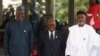 ECOWAS president Omar Touray (L), Ghana President Nana Akufo-Addo (C), and Nigerian Minister of Foreign Affairs Yussuf Tuggar at the ECOWAS 66th Ordinary Session of the Authority of Heads of States and Government in Abuja on Dec. 15, 2024. 