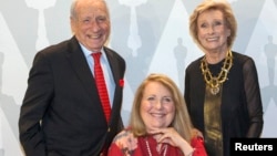 FILE - Filmmaker and comedian Mel Brooks poses with actresses Cloris Leachman, right, and Teri Garr at a 40th anniversary screening of "Young Frankenstein" in Beverly Hills, California, Sept. 9, 2014.