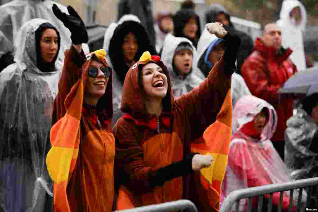 People attend the 98th Macy's Thanksgiving Day Parade in New York City, Nov. 28, 2024.