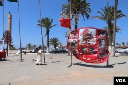 In Tripoli's Martyr's Square, anti-Haftar banners still fly as it nears the end of three months of fighting for the city, July 1, 2019. (H.Murdock/VOA)