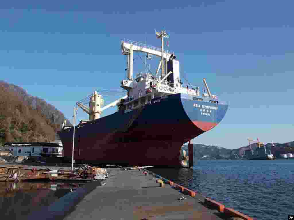 The 6,000-ton 'Asia Symphony' was washed onto the Kamaishi docks by the tsunami (VOA 0 H. Ridgwell)