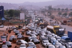 A traffic gridlock is seen as people attempt to rush out of Abuja, Nigeria, following efforts of the authorities trying to contain the spread of the coronavirus disease (COVID-19), March 30, 2020.