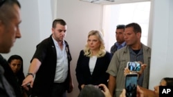 FILE - Wife of the Israeli Prime Minister Benjamin Netanyahu, Sara, enters a courtroom in Jerusalem, Oct. 7, 2018.