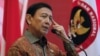 Menteri Koordinator bidang Politik, Hukum dan Keamanan Wiranto dalam pertemuan antara mantan militan dan para korban di Jakarta, 28 Februari 2018. (Foto: Reuters)