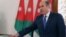A handout picture released by the Jordanian Royal Palace on Sept. 28, 2016 shows Jordan's Prime Minister Hani Mulki taking a oath at the swearing in ceremony of Jordan's new government in Amman.