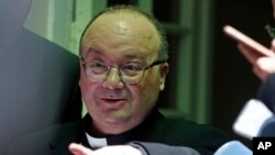 Archbishop Charles Scicluna attends a press conference prior to a meeting with people who claim to have been victims of sexual abuse by members of the Catholic Church, in Santiago, Chile, Feb. 20, 2018.