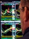 A specialist works at his post on the floor of the New York Stock Exchange on March 12, 2025.