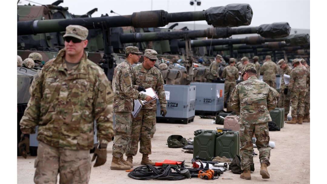 U.S. troops check military equipment after their deployment to Drawsko Pomorskie, Poland, March 21, 2019.