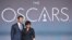 From left, Chris Hemsworth and President of the Academy Cheryl Boone Isaacs announce the Academy Awards nominations at the 86th Academy Awards nomination ceremony on Jan. 16, 2013 in Beverly Hills, Calif.