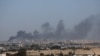 Smoke rises during an Israeli ground operation in Khan Younis