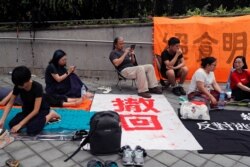 Protesters take part in a hunger strike during a demonstration against a proposed extradition bill in Hong Kong, China June 13, 2019.