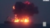 This image from a video released on Aug. 23, 2024, by Yemen's Houthi Ansarullah Media Center shows what they say is the Greek-owned oil tanker Sounion, which they reportedly hit by three projectiles on Aug. 21, 2023.