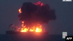 This image from a video released on Aug. 23, 2024, by Yemen's Houthi Ansarullah Media Center shows what they say is the Greek-owned oil tanker Sounion, which they reportedly hit by three projectiles on Aug. 21, 2023.